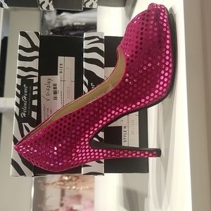 Sizes 7 and 8. Fushia high heels.